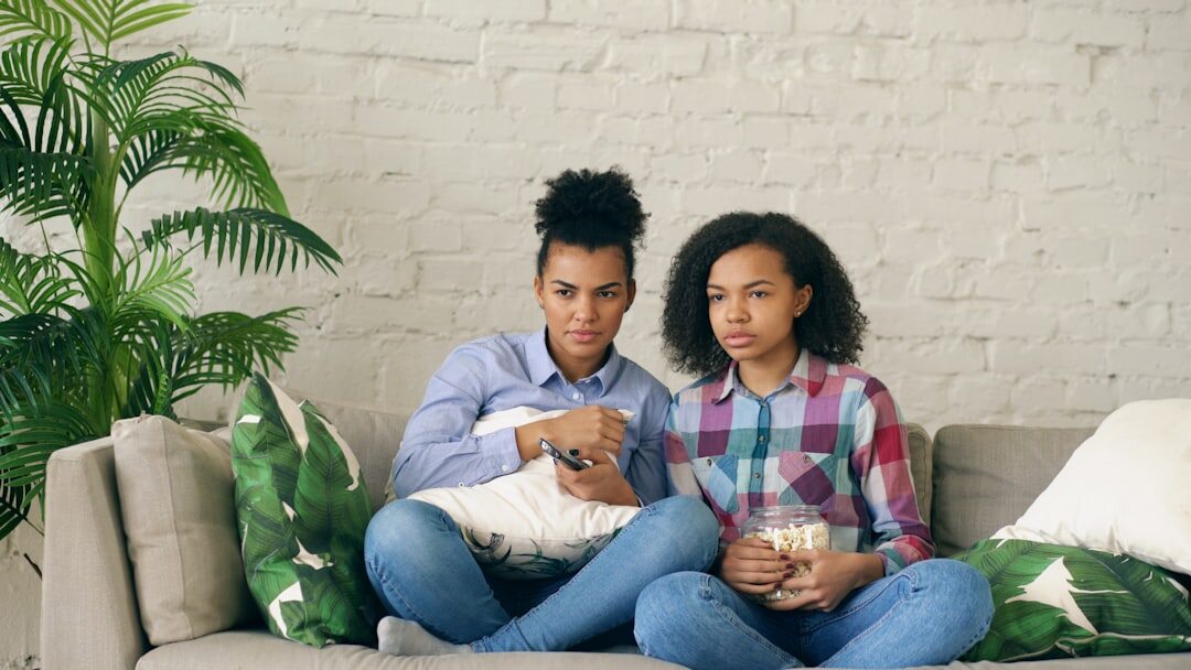 people watching tv series on couch