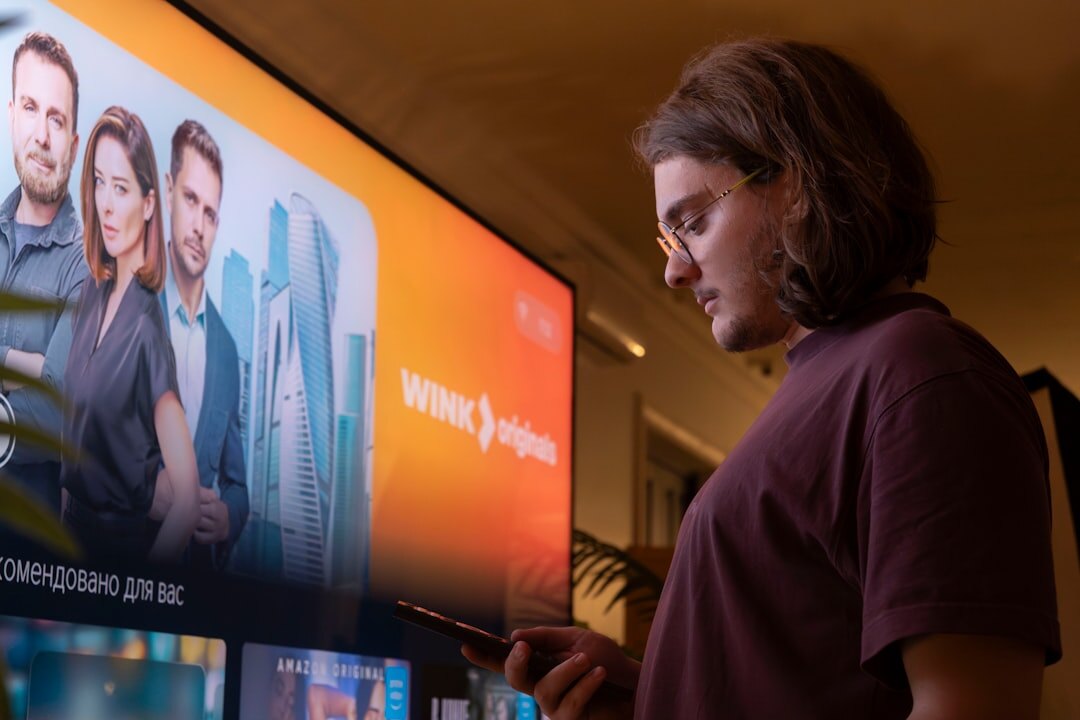 person watching online tv at home
