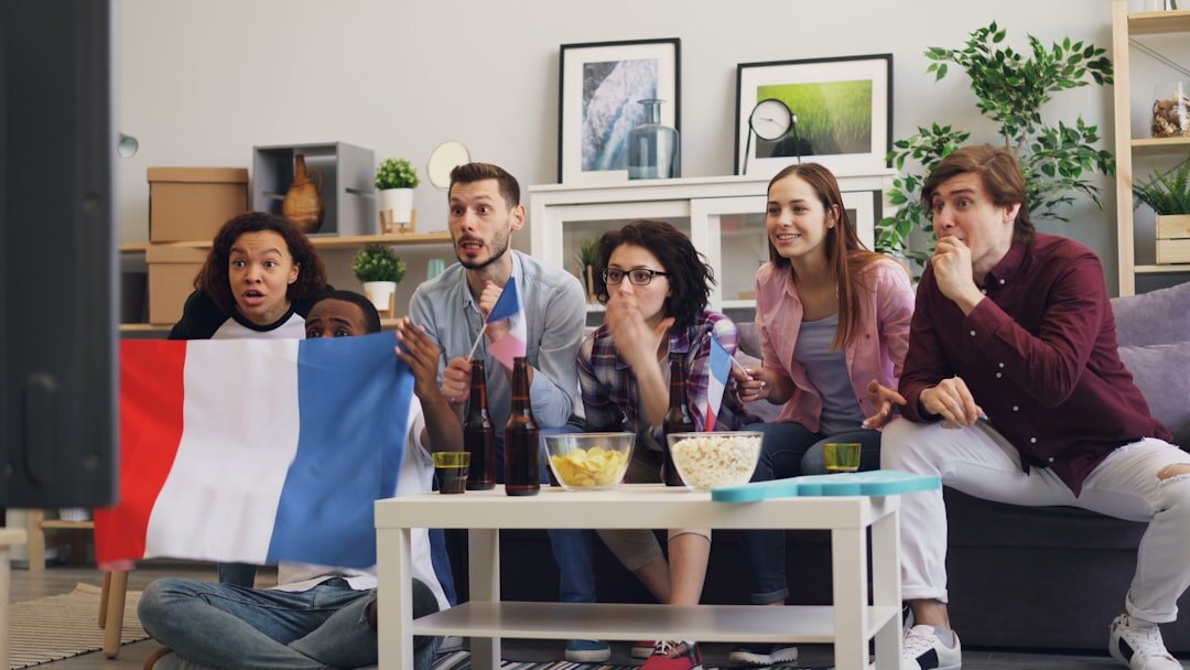 group of friends watching tv together